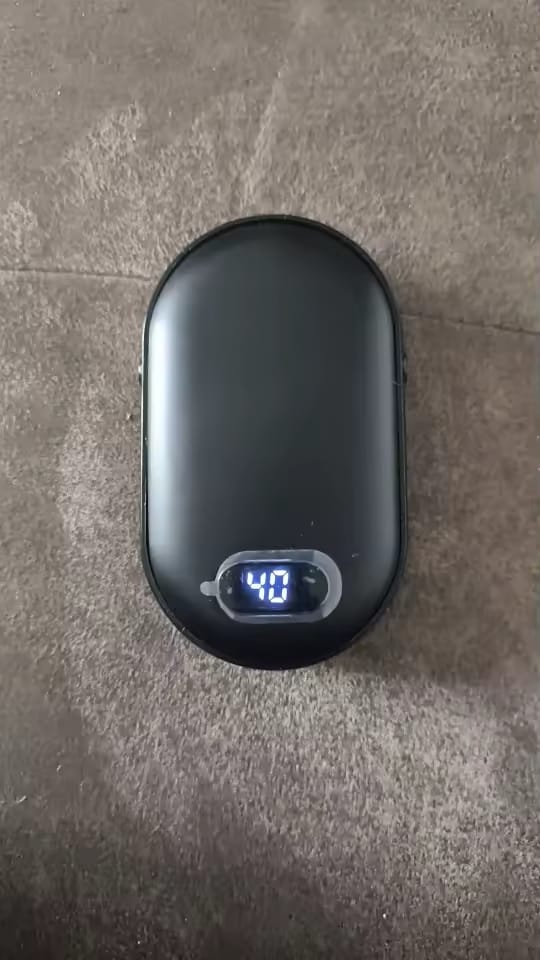 Customer photo review of Calentador de Manos con Carga