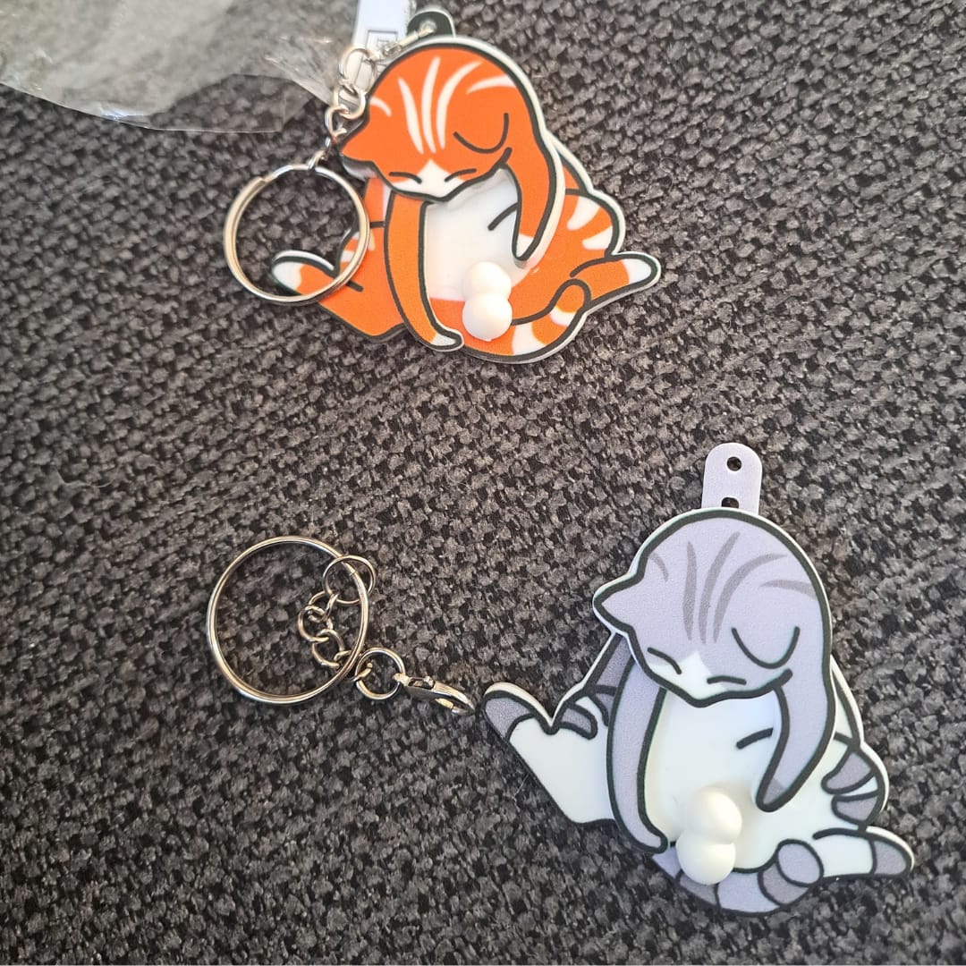Customer photo review of Mischief Cat - Interactuve Cat Keychain