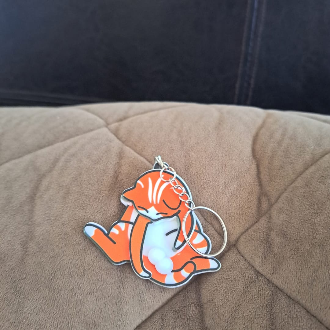 Customer photo review of Mischief Cat - Interactuve Cat Keychain