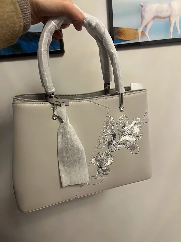 Customer photo review of Tang Red 30 Embroidered Magnolia Tote