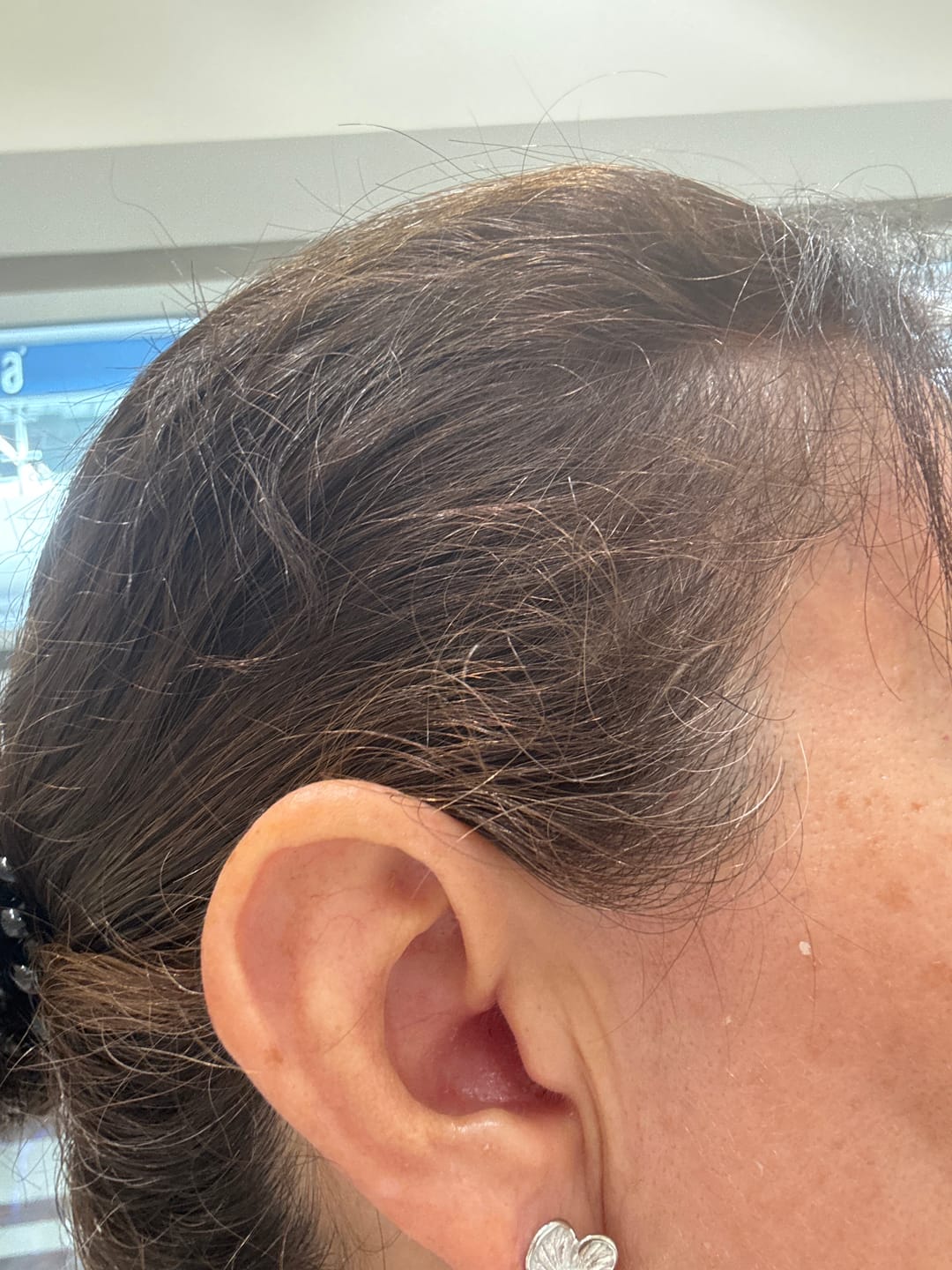 Customer photo review of Par Arracada Plateada Con Mini Aros Dorados