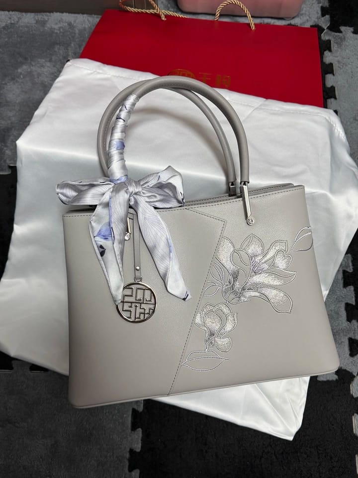 Customer photo review of Tang Red 30 Embroidered Magnolia Tote