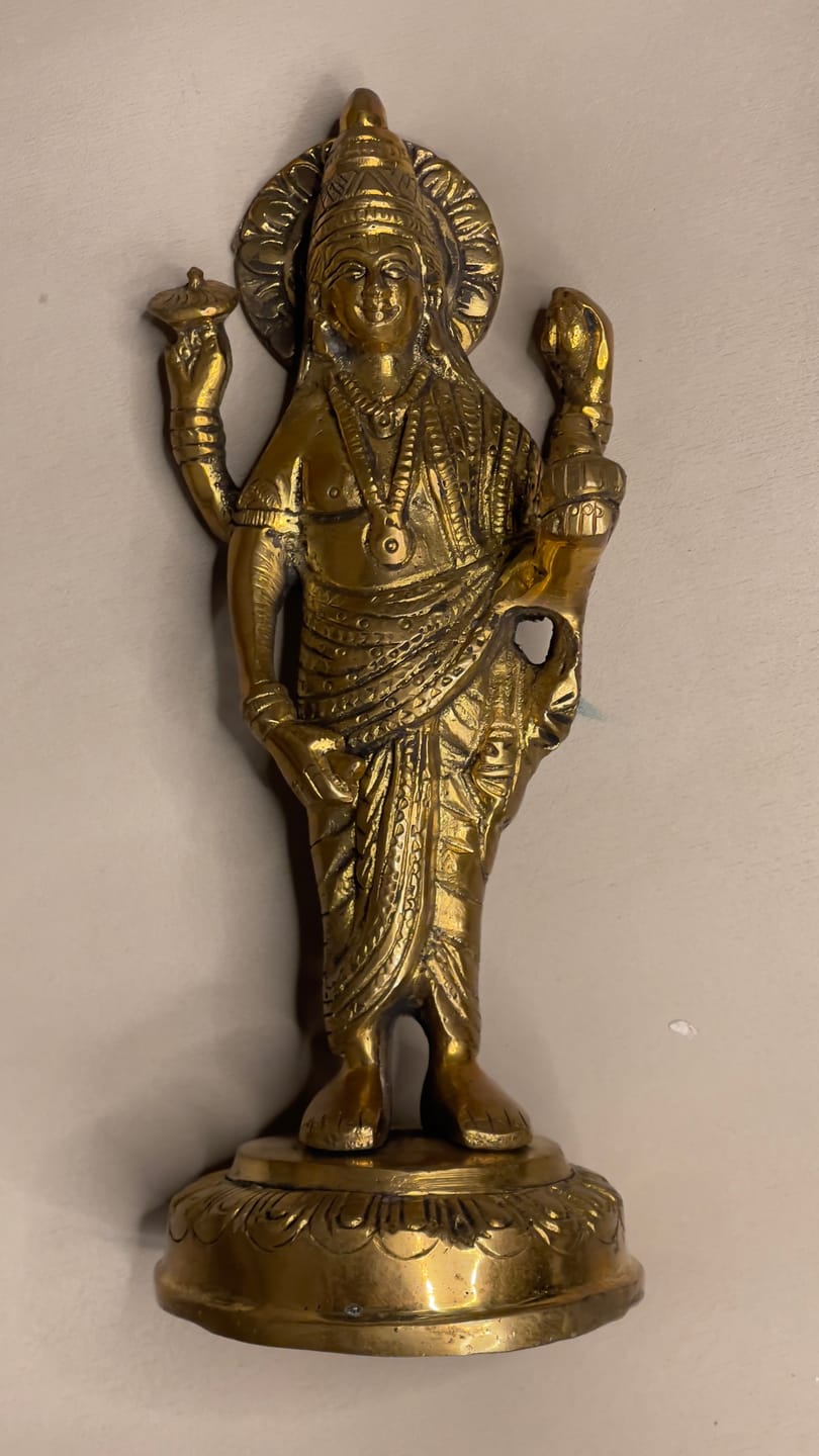 Customer photo review of Pure Brass Dhanvantri Ji Idol Vastu Remedy for Health, Healing and Positive Energy for Home and Office | 9 x 3.5 x 20 cm | 1.10 kg