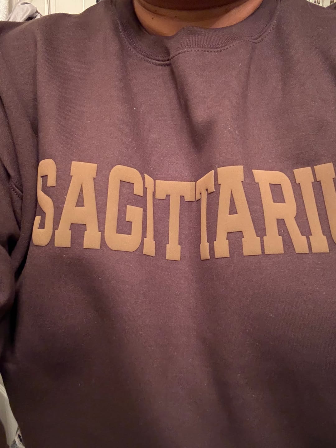 Customer photo review of Chocolate Zodiac Puff Print Crewneck