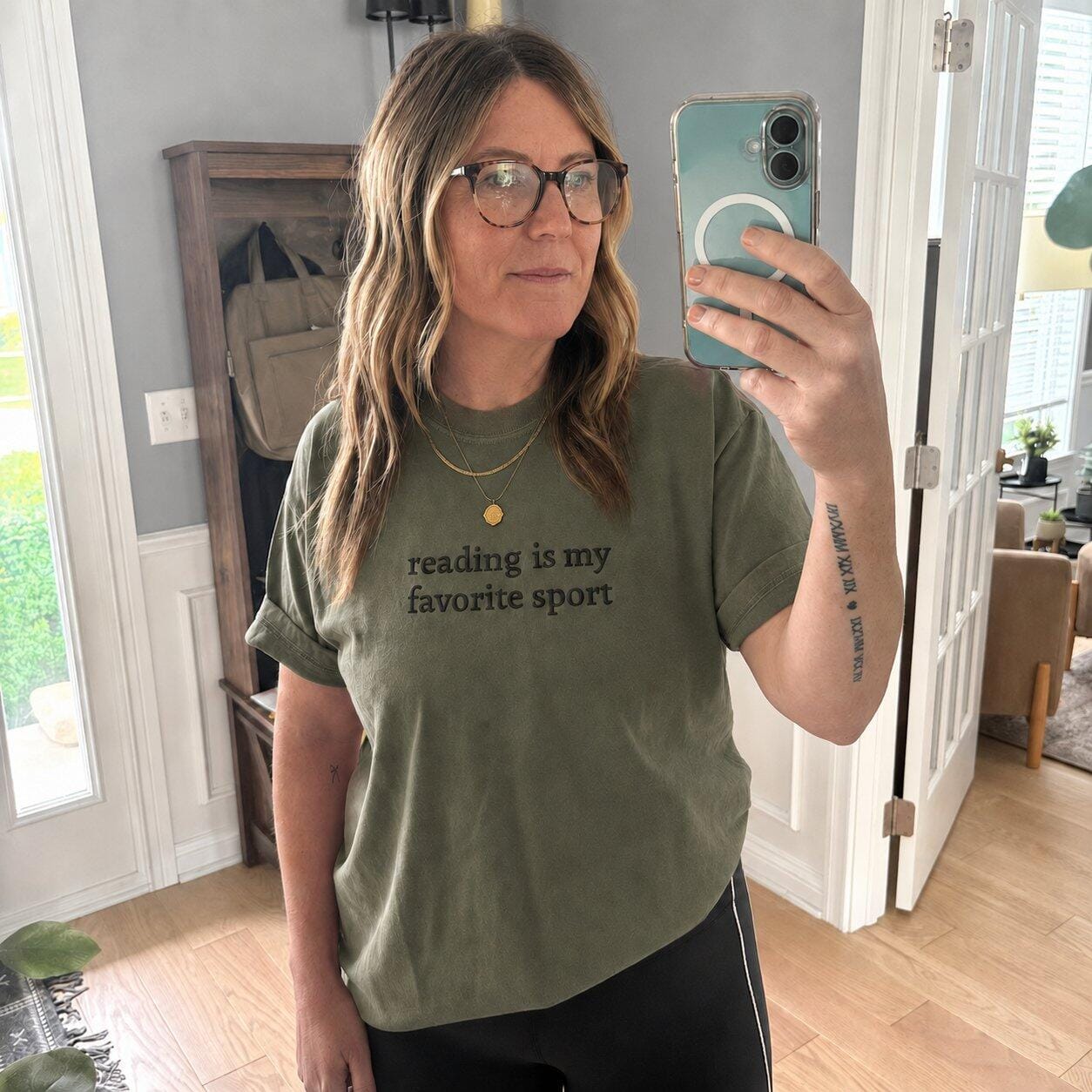 Customer photo review of Reading Is My Favorite Sport Embroidered Comfort Colors T-Shirt | Book Lover Gift