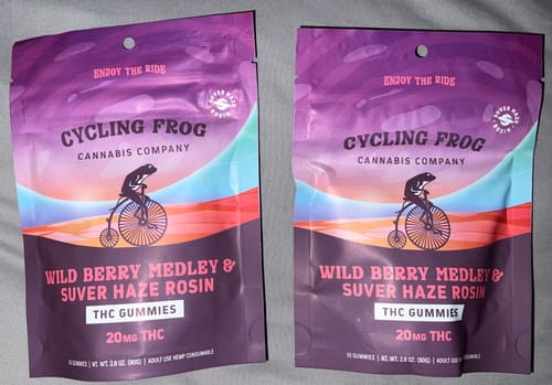 Reviewer's two purple Wild Berry Medley Rosin Gummies bags sitting side by side.