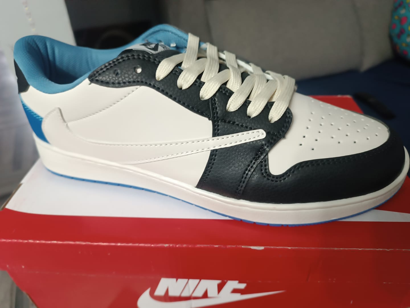Customer photo review of Tenis Travis Low OG Fragment X