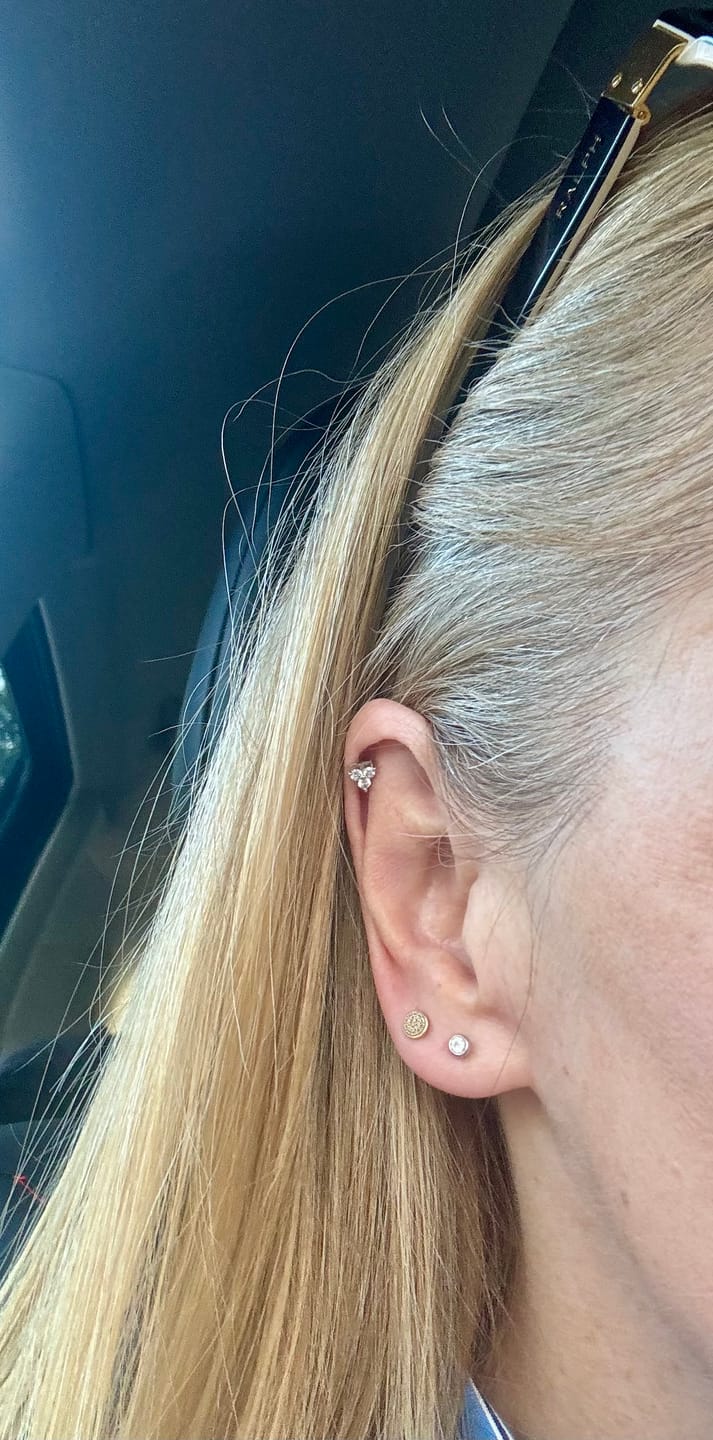 Customer photo review of Moissanite Trinity Sleep Stud Earrings