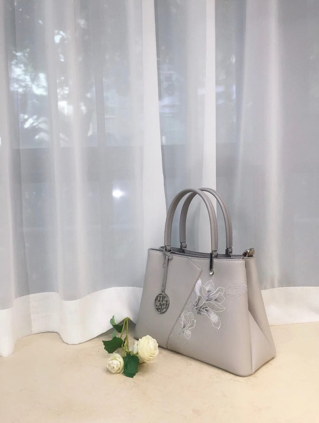 Customer photo review of Tang Red 30 Embroidered Magnolia Tote