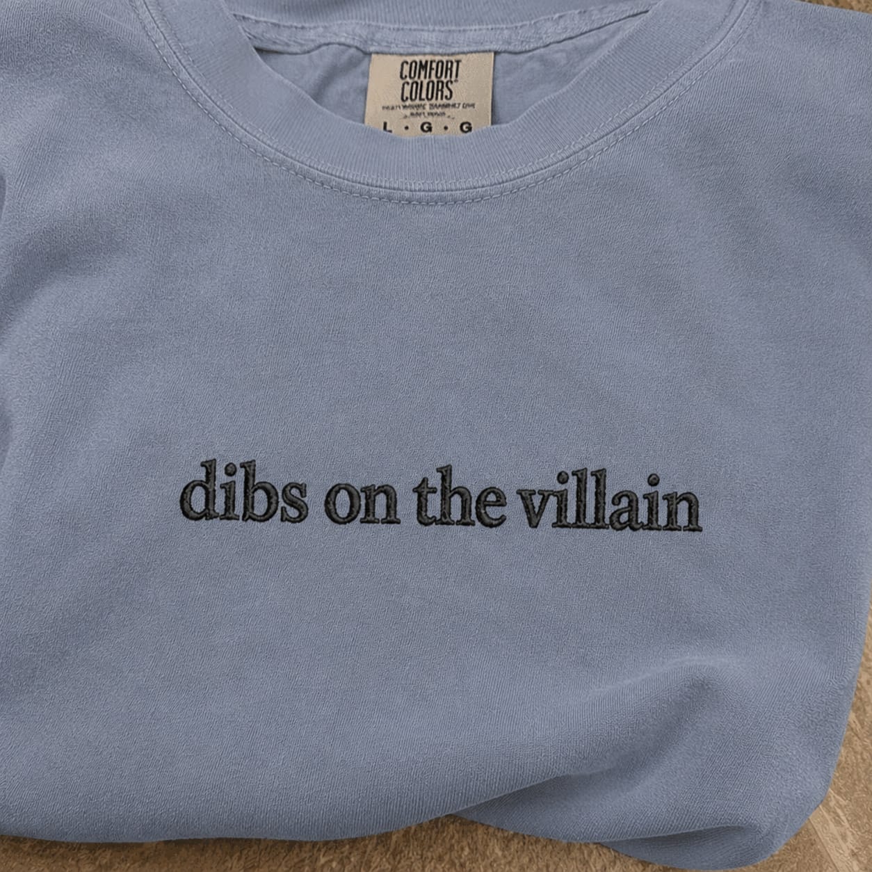 Customer photo review of Dibs On The Villain Embroidered Comfort Colors T-Shirt | BookTok Book Lover Gift