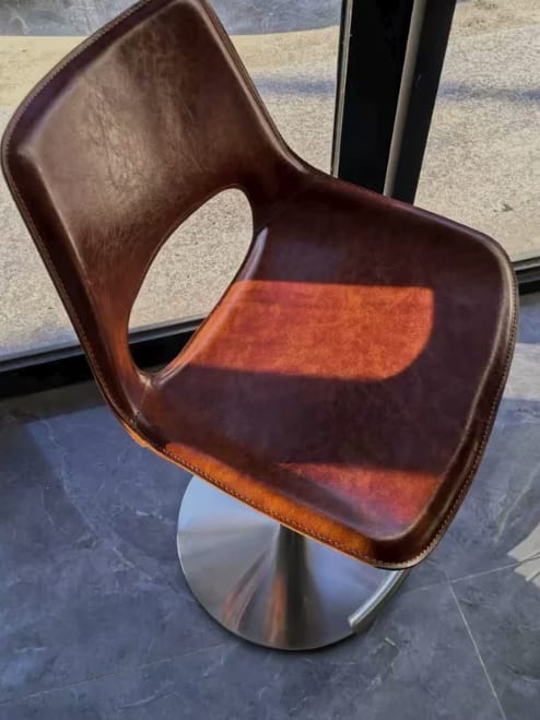 Customer photo review of Modern Adjustable Swivel Leather Low Back Bucket Bar Stool