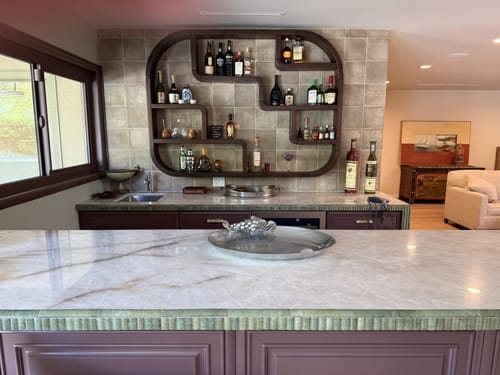 Customer photo review of Boho Wall Mounted Wine Holder, Handcrafted Floating Wood Bottle Rack & Accent Storage Feature for Dining Space
