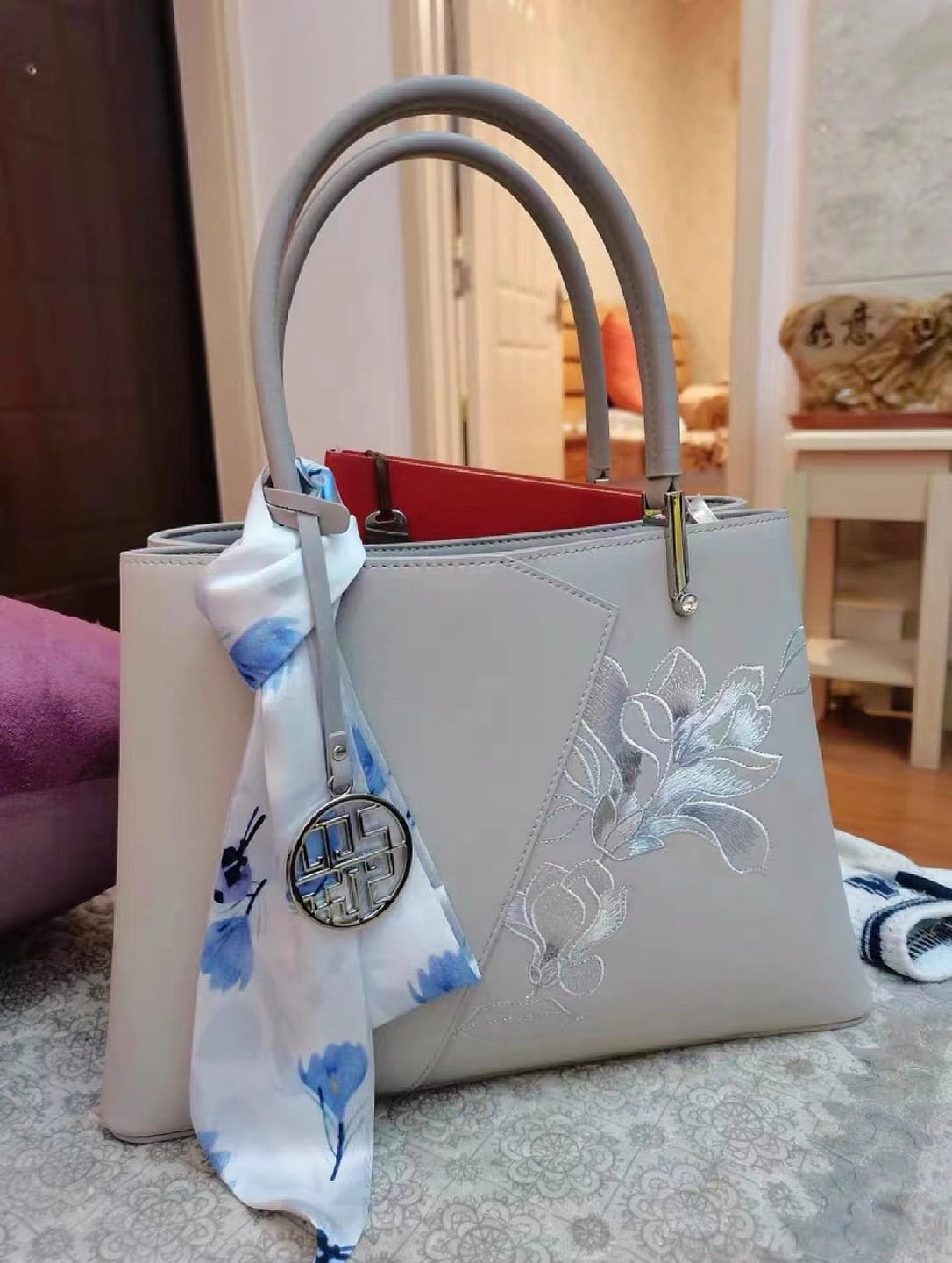 Customer photo review of Tang Red 30 Embroidered Magnolia Tote