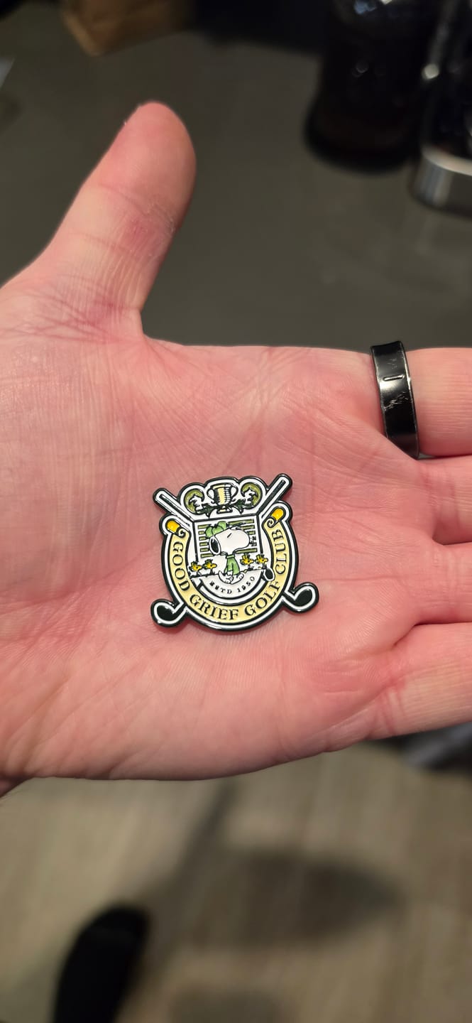 Customer photo review of Peanuts Clubhouse Crest Ball Marker
