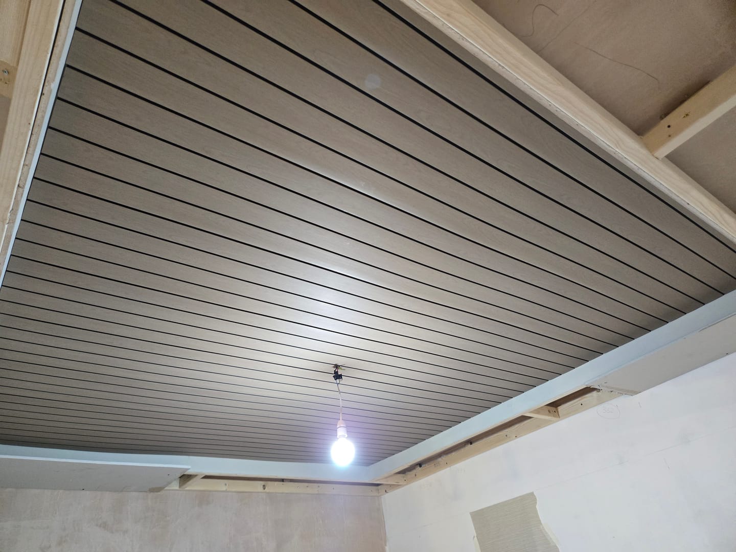 Customer photo review of Tongue and Groove Washed Oak Wood Effect Waterproof Wall Panel