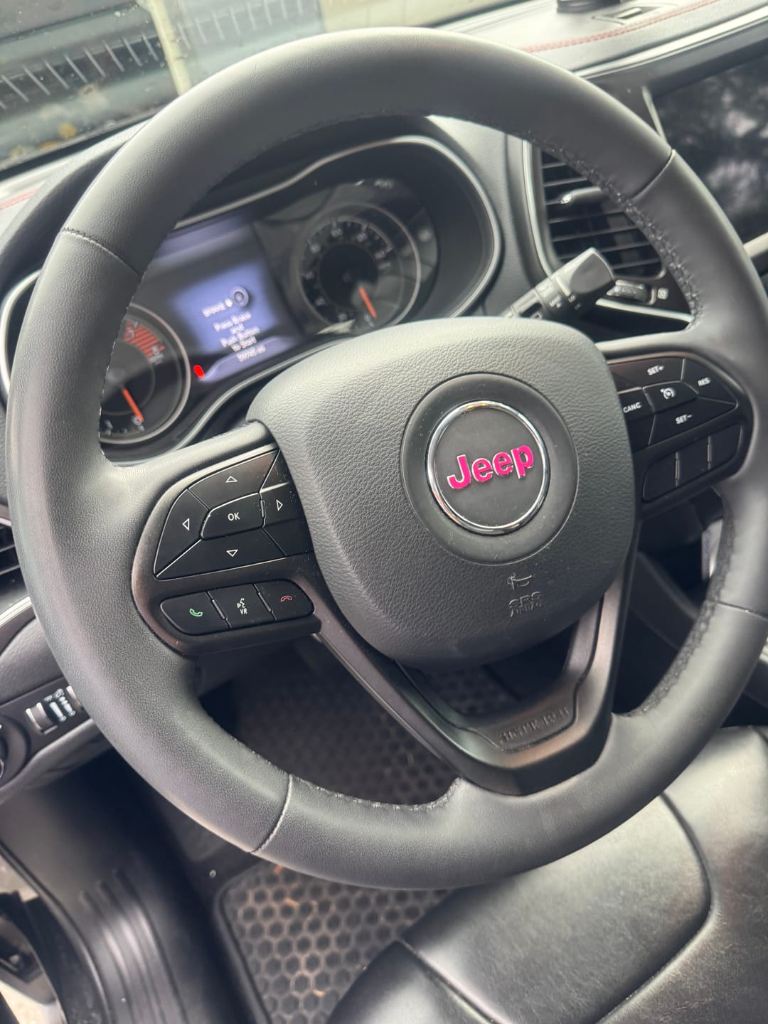 Customer photo review of JEEP Steering Wheel Emblem Overlay Decal — 30+ Colors & Designs (Flag, Topo, Animal, Solid)