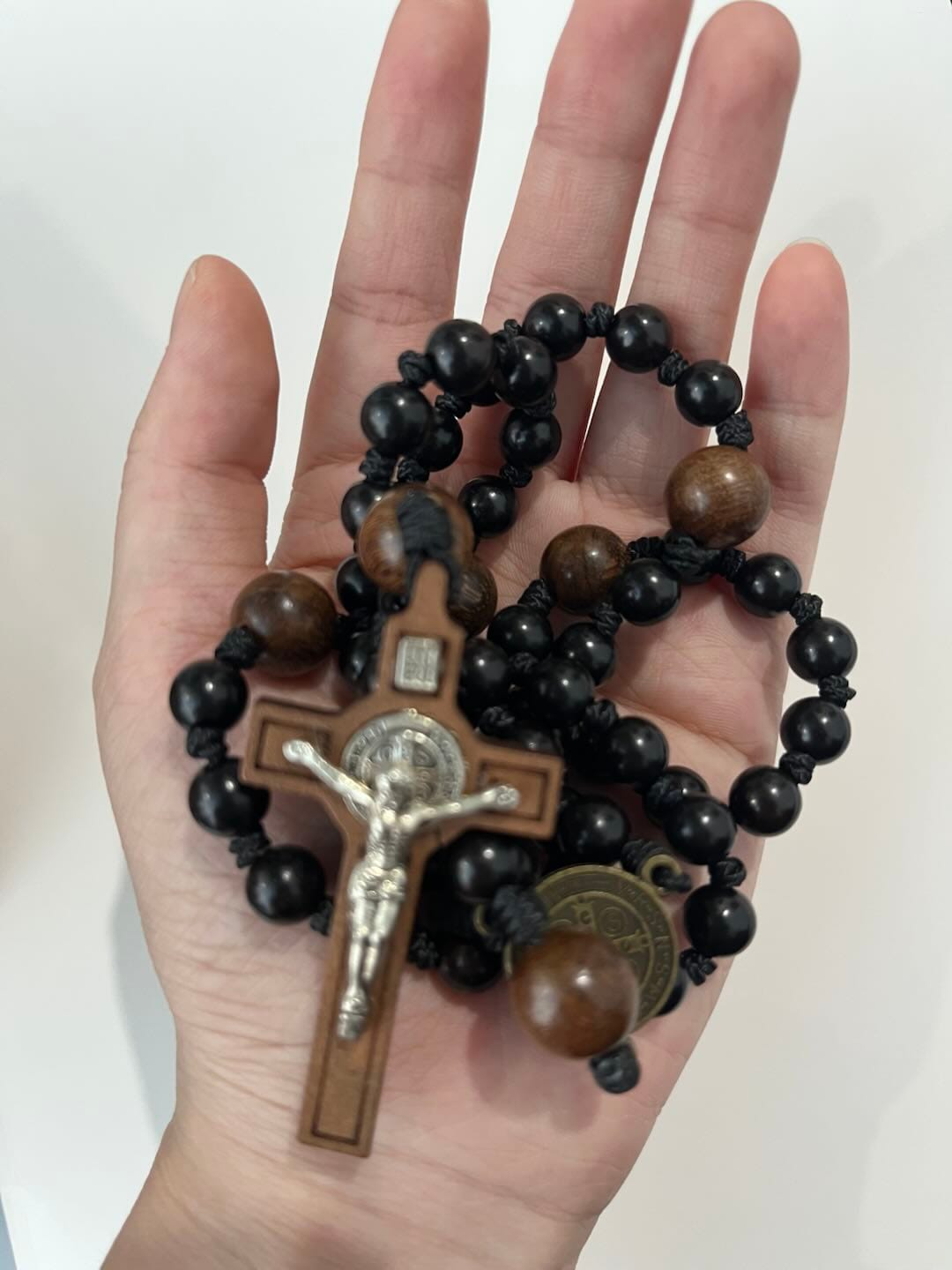 Customer photo review of SolaceBeads Black Sacred Ebony Beads with St. Benedict Centerpiece Rosary