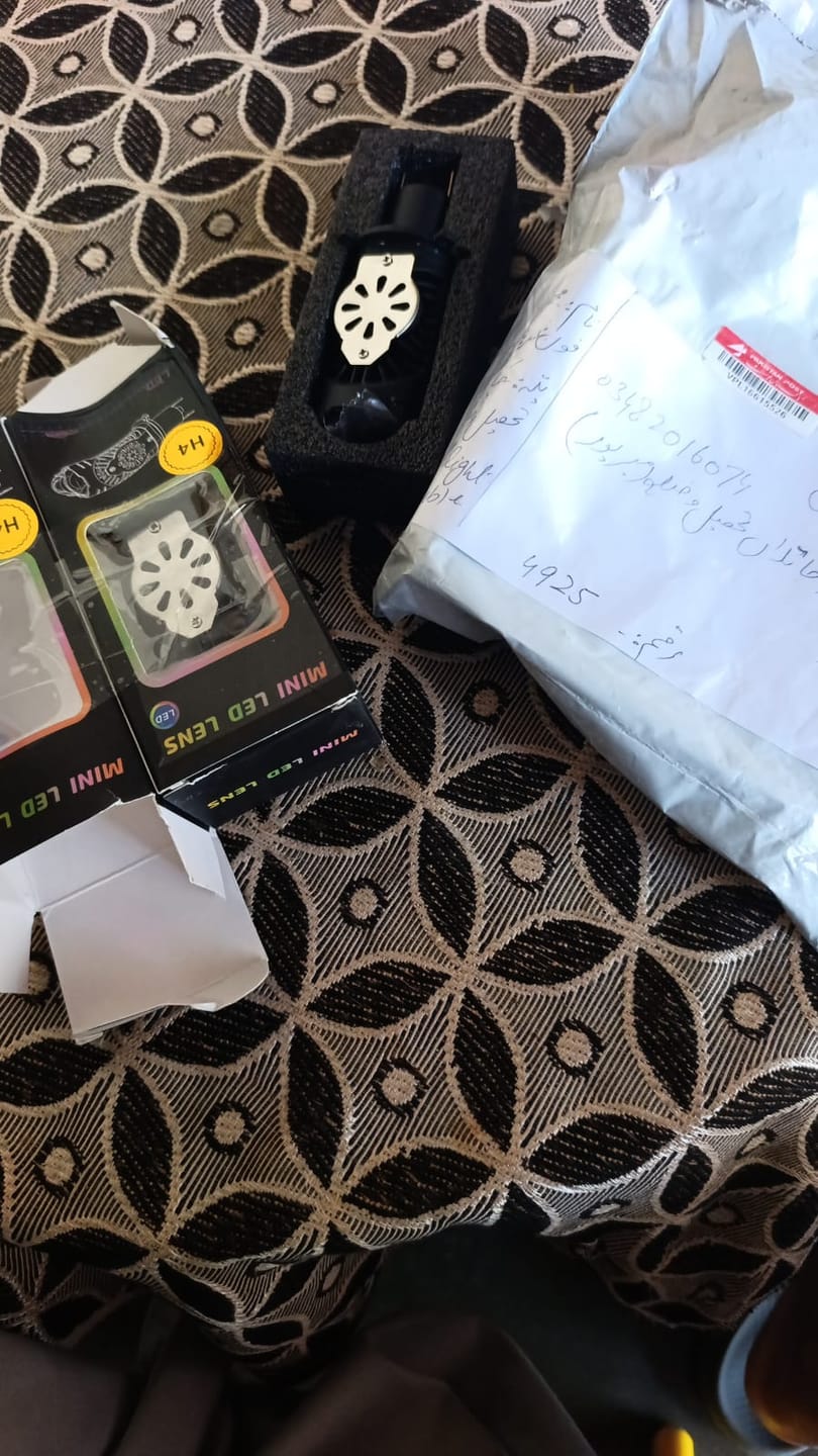 Customer photo review of 1pc Super Beam H4 Mini Projector Lens Bulb Bikes