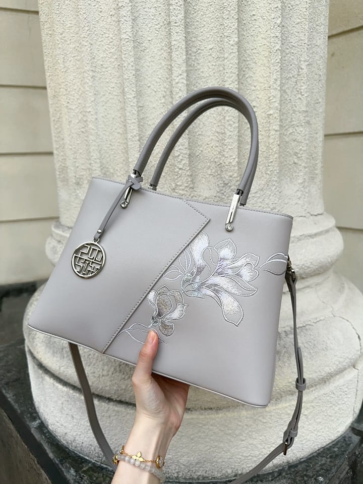 Customer photo review of Tang Red 30 Embroidered Magnolia Tote
