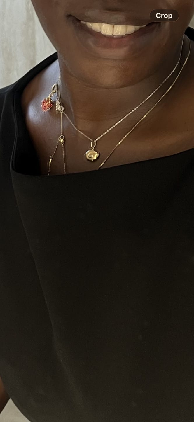 Customer photo review of Evil Eye Pebble Pendant