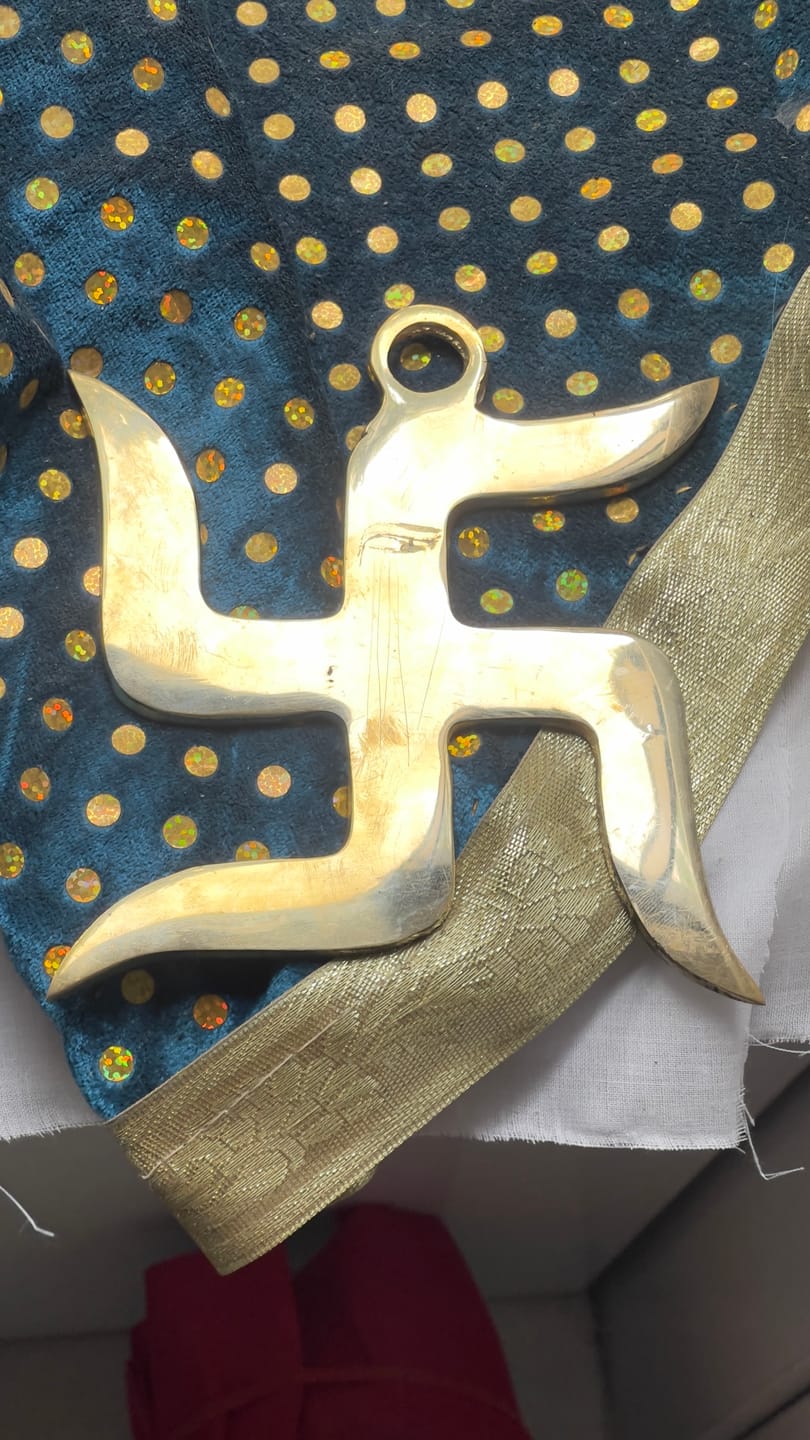 Customer photo review of Brass Swastik Wall Symbol | Vastu Remedy for Main Entrance & Auspicious Energy | 5 & 9 Inch
