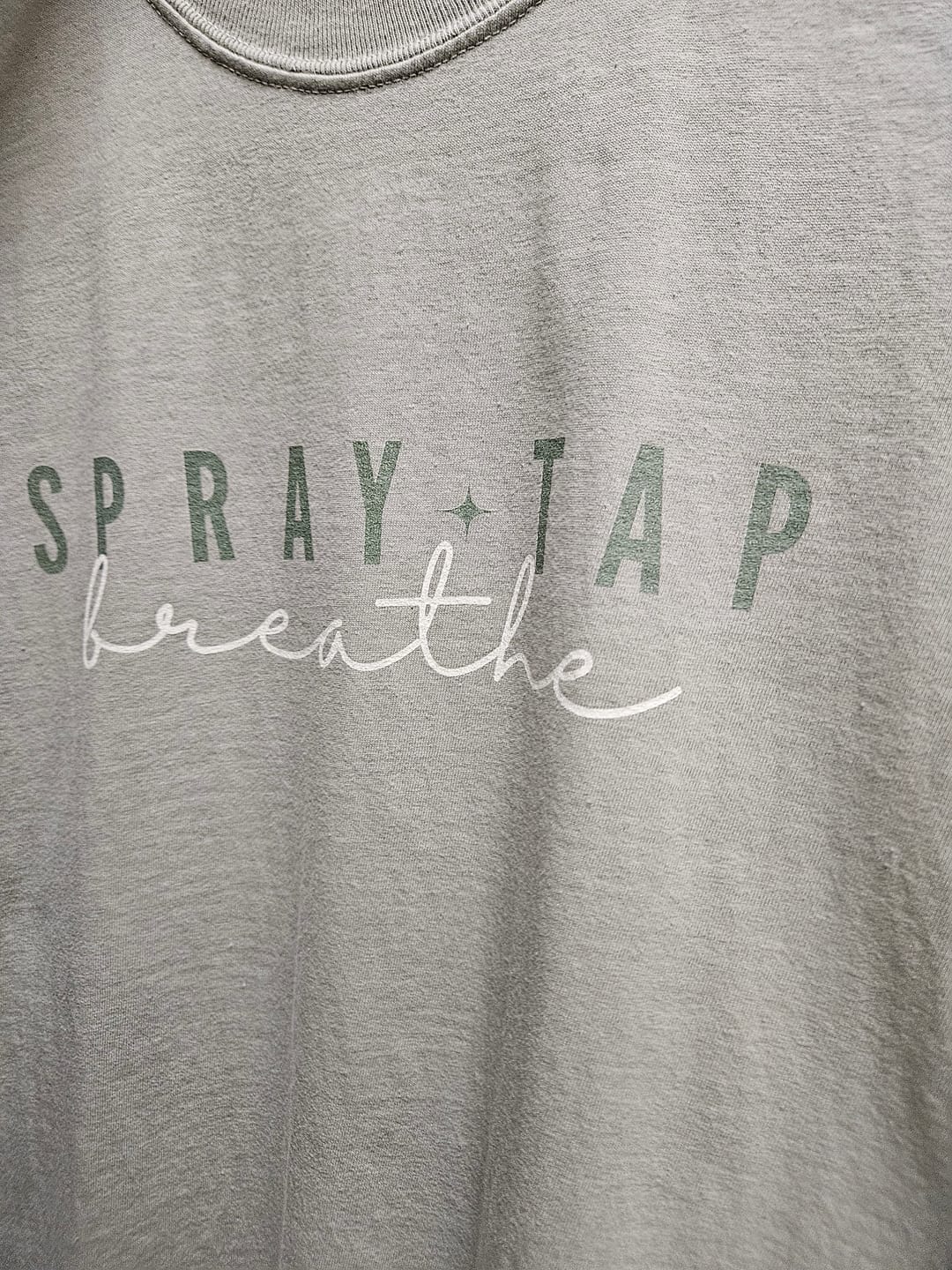 Customer photo review of Spray Tap Breathe Comfort Tee