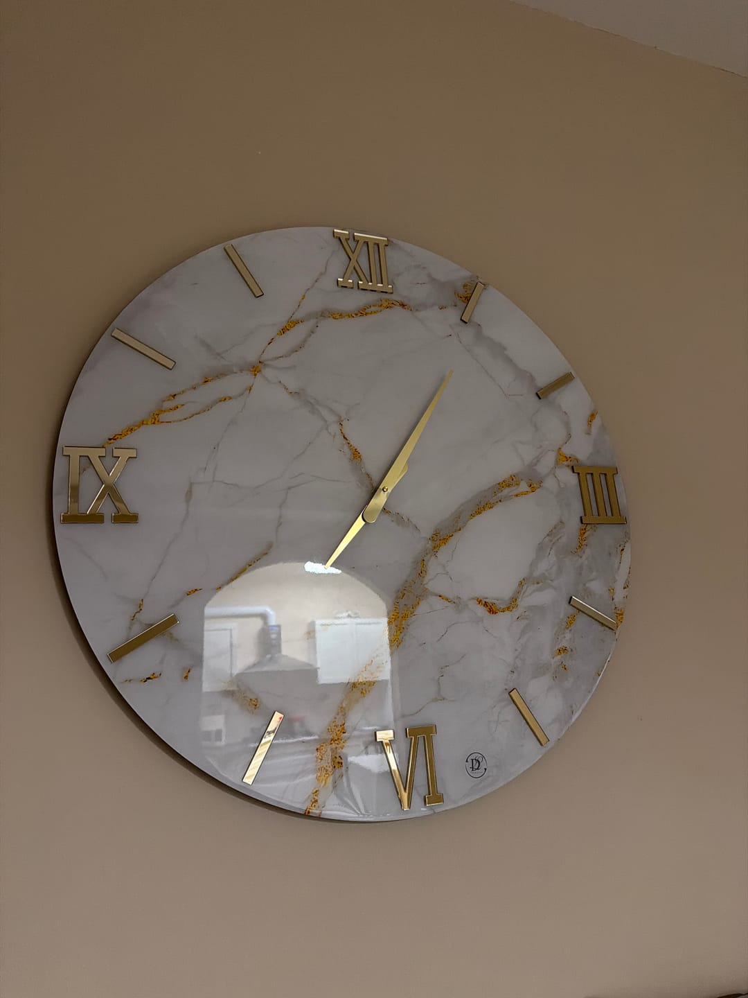 Customer photo review of Orologio da parete effetto marmo Carrara gold design moderno