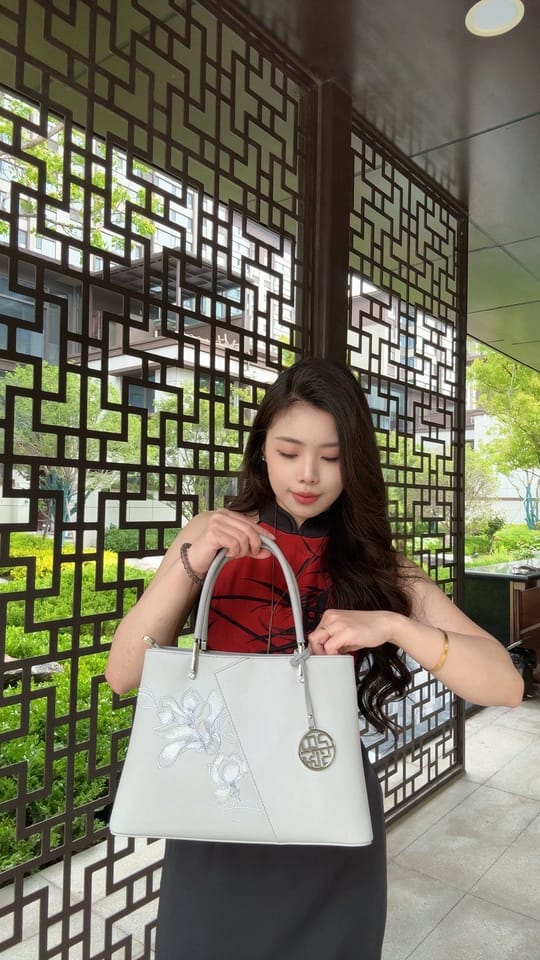 Customer photo review of Tang Red 30 Embroidered Magnolia Tote