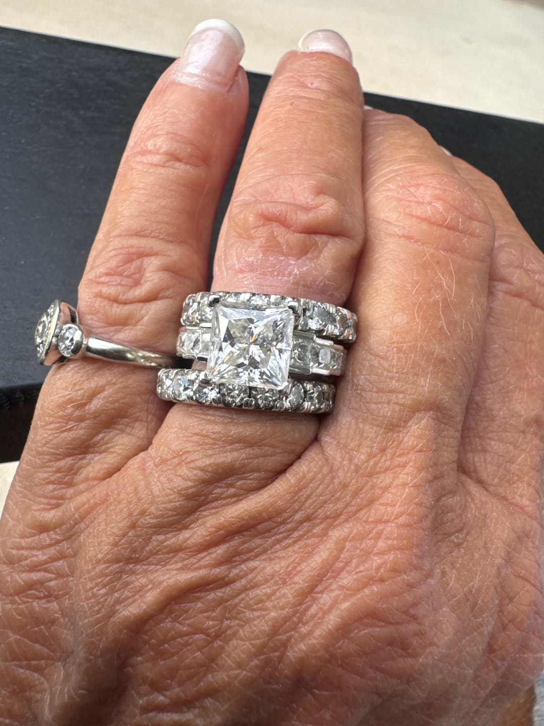 Customer photo review of Princess Cut Moissanite Staircase Channel Set Engagement Ring
