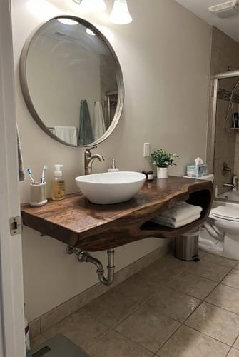 Customer photo review of Rustic Solid Wood Bathroom Shelf, Wall Mounted Floating Storage Organizer Rack for Industrial Style Bathrooms