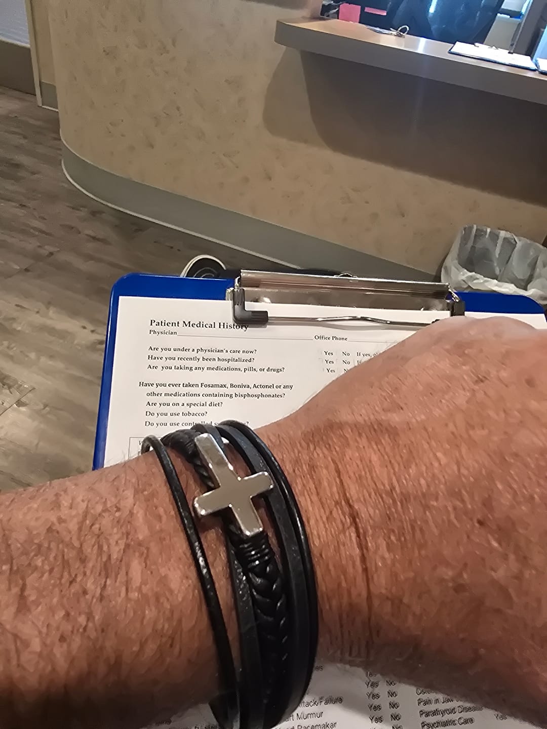 Customer photo review of Christianartworkshop Braided Cross Leather Bracelet: Steady Grace for Everyday Wrists