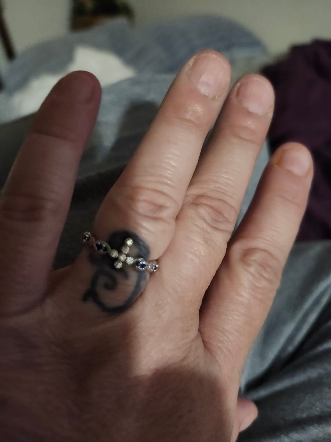 Customer photo review of FREE Today: Dainty Cross Ring with Blue Zircon Accents: A Symbol of Faith and Serenity