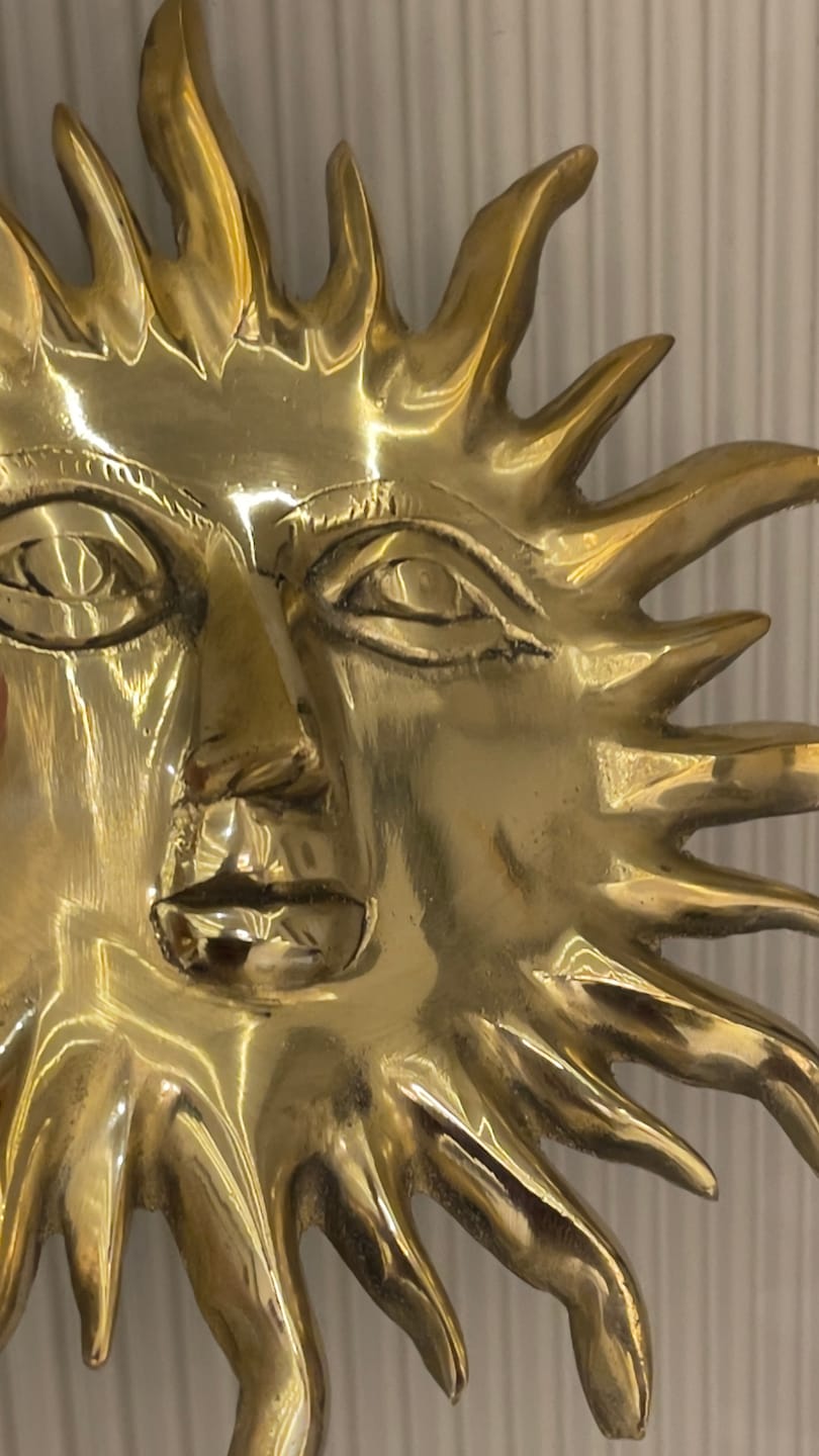 Customer photo review of Solid Brass Sun Face Wall Idol | Vastu Remedy for East Direction Prosperity & Fame | Main Door, Living Room & Office | 24 × 24 cm | 1 kg