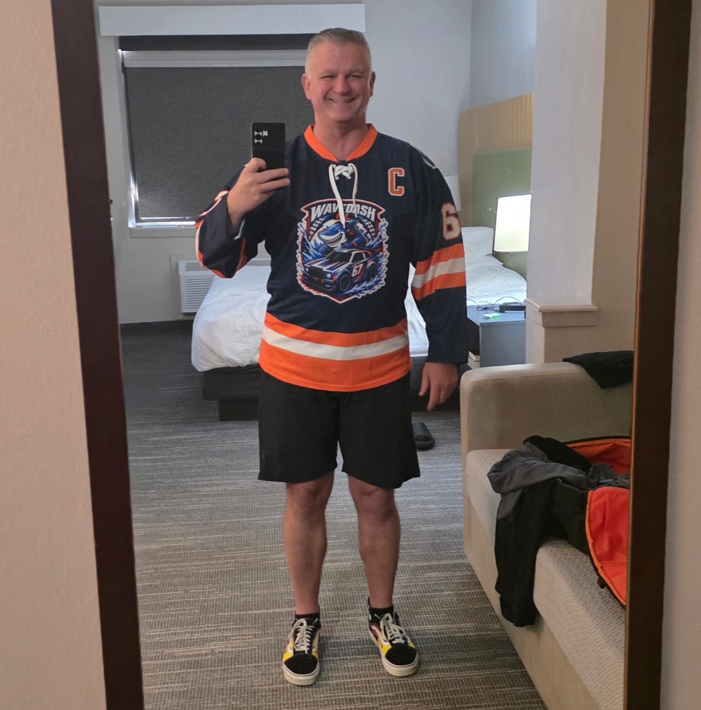 Customer photo review of Custom Navy Orange-White Lace-Up Neck Hockey Jersey