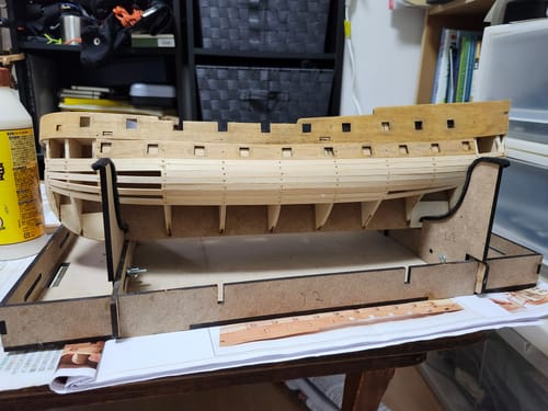 Customer's wooden Royal Fortune model ship kit partially assembled on a workspace stand.