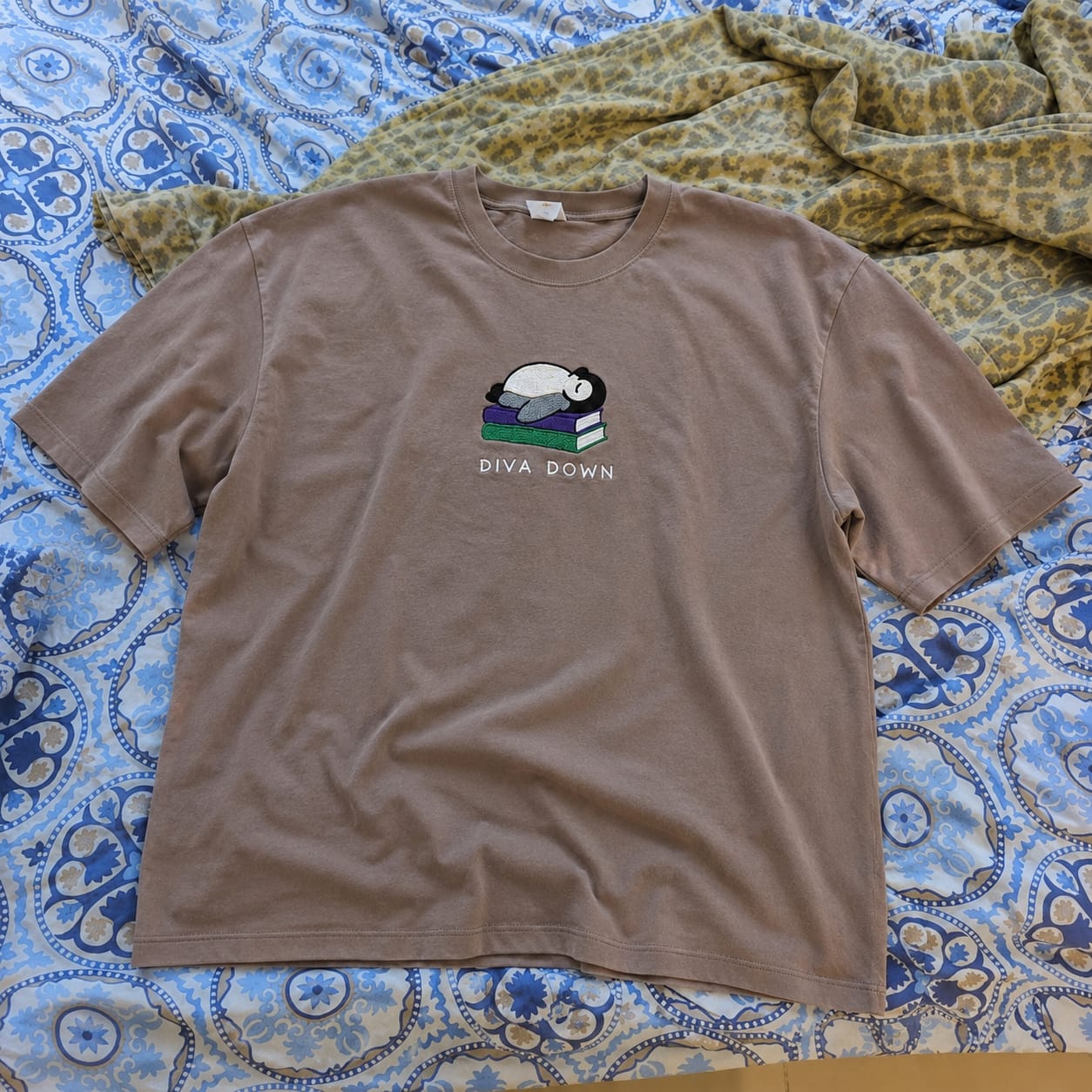 Customer photo review of Diva Down Penguin Embroidered Comfort Colors T-Shirt | Funny Book Lover Gift