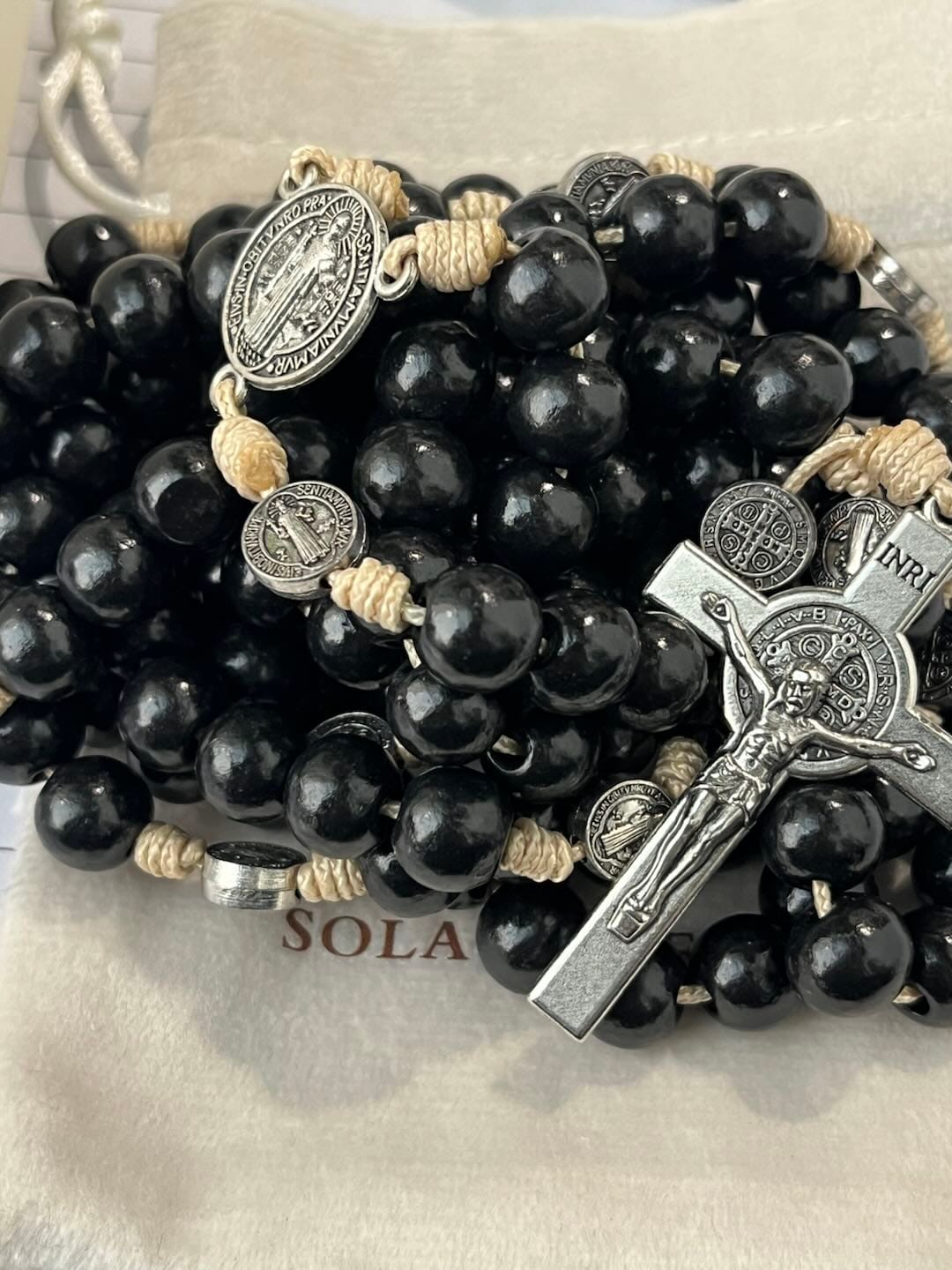 Customer photo review of SolaceBeads 15/20 Decade Ebony Wood Rosary With St. Benedict Medals & Crucifix: Protective Strength