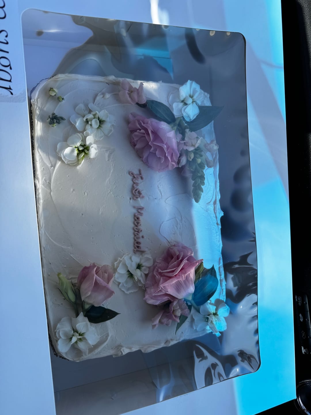 Customer photo review of floral sheet cake