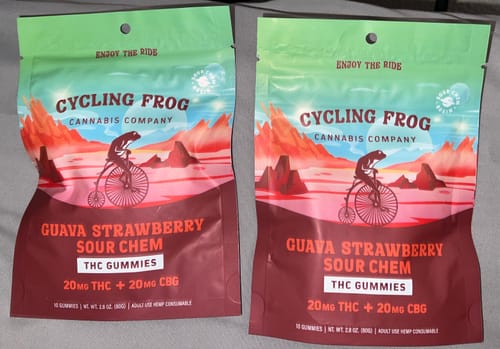Customer's two unopened bags of Guava Strawberry Rosin Gummies showing frog riding a bicycle on the label.