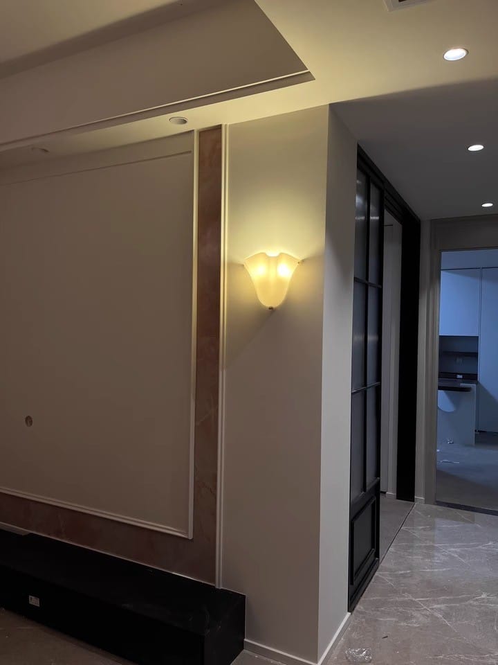 Customer photo review of Sculpted Glass Flower Wall Sconce