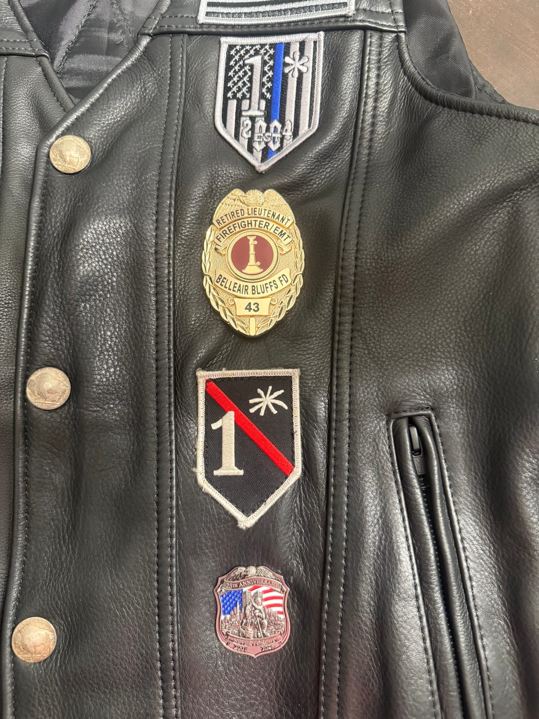 Customer photo review of Never Forget 25th Anniversary 9/11 Firefighter Shield Pin