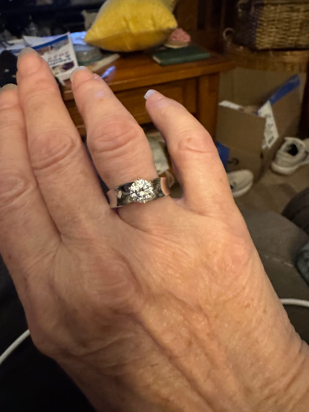 Customer photo review of Solitaire Round Moissanite Concave Wide Band Engagement Ring