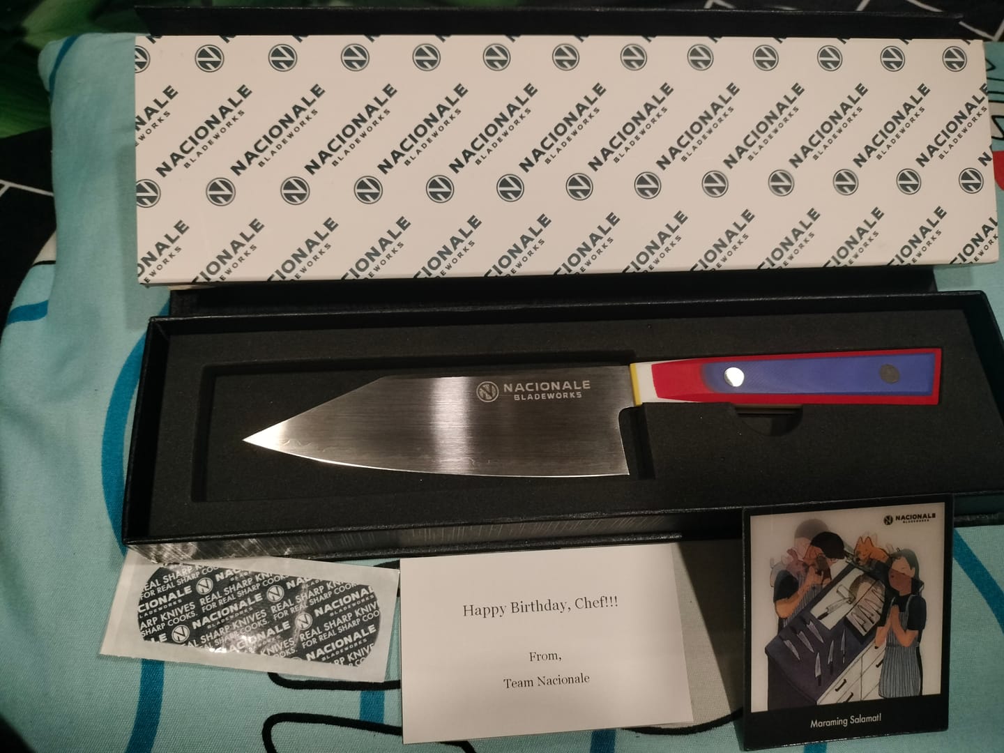 Customer photo review of 125mm Full Tang San Mai AUS10. Utility Knife. Layered G10 Scales