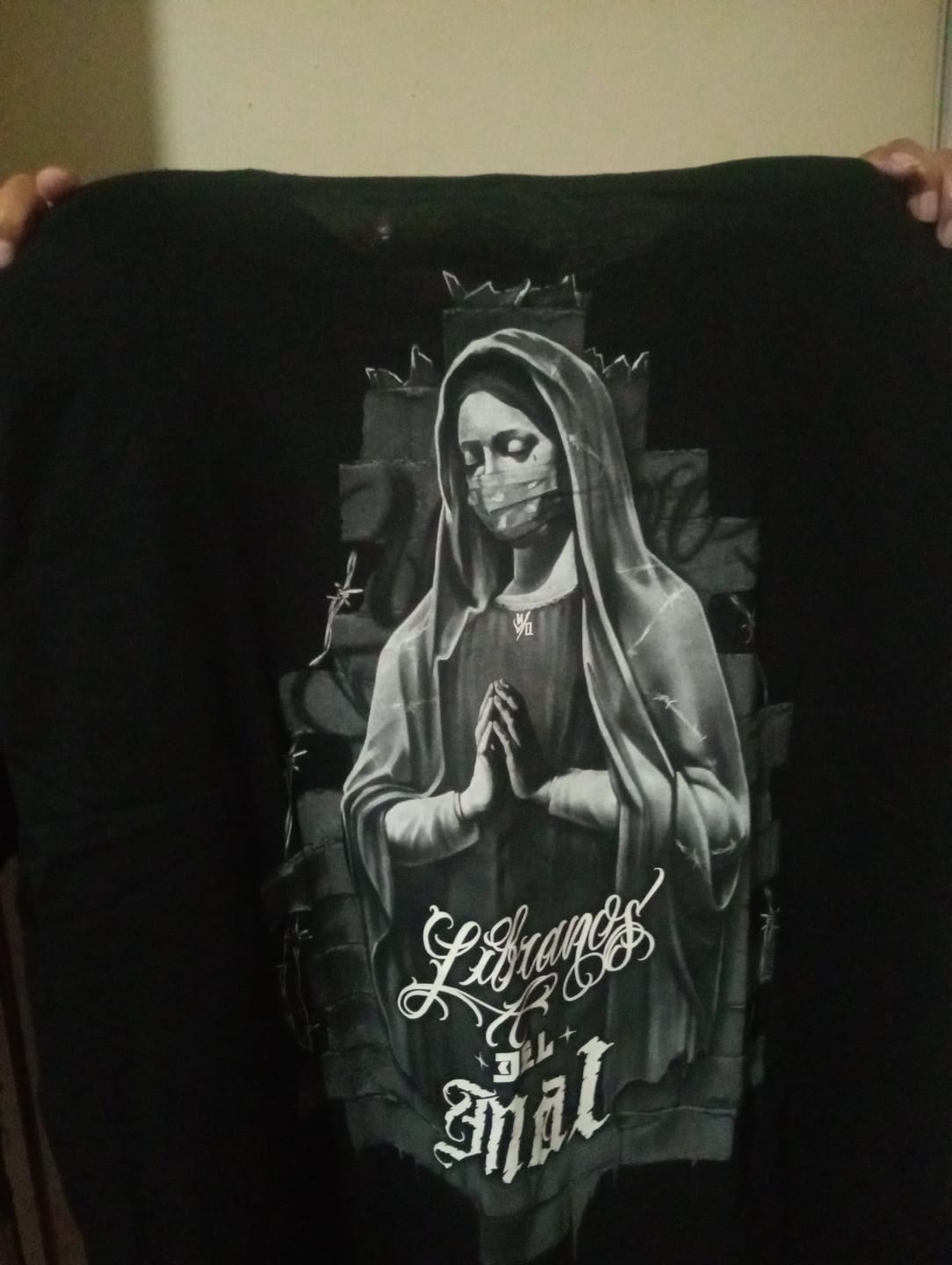 Customer photo review of Amen Tee