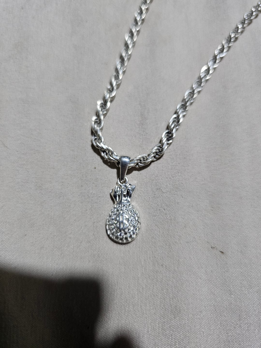 Customer photo review of Dije Bolsa de Dinero Zirconia Plata Ley 925
