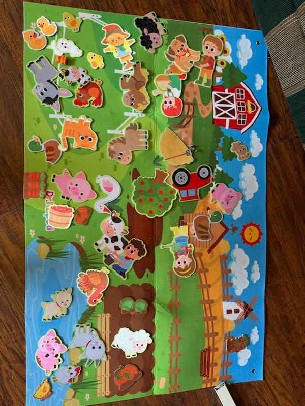 Customer photo review of Littlestorieskids Interactive Activity Board: Inspiring independent play from the very first use.