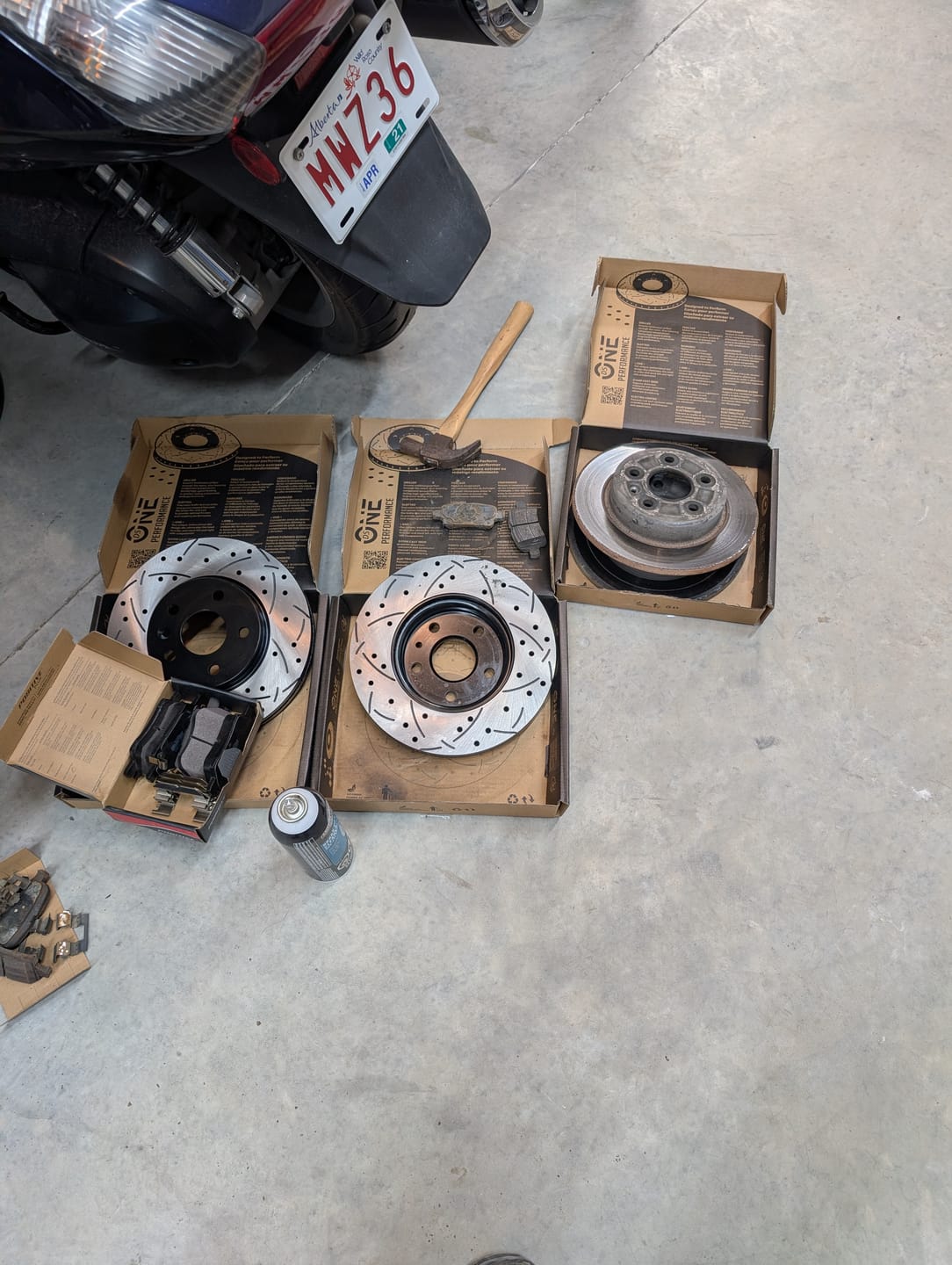 Customer photo review of Front Rear Coated Drilled Slotted Disc Brake Rotors And Semi-Metallic Pads Kit For Chevrolet Cruze Volt Bolt EV EUV KDF-100956