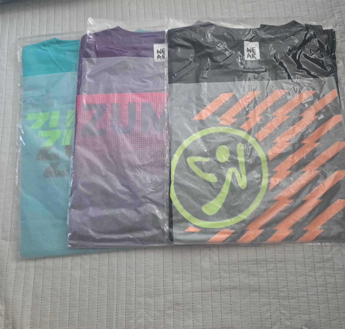 Customer photo review of Electric Feel Unisex Tees 12PK