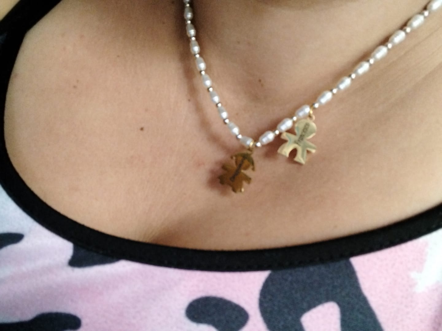 Customer photo review of Girocollo perline con bambini e incisione