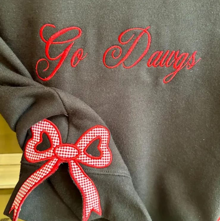 Customer photo review of Custom Tennessee Volunteers Women’s Team Spirit Sweatshirt – Applique Embroidered Side Bow Pullover
